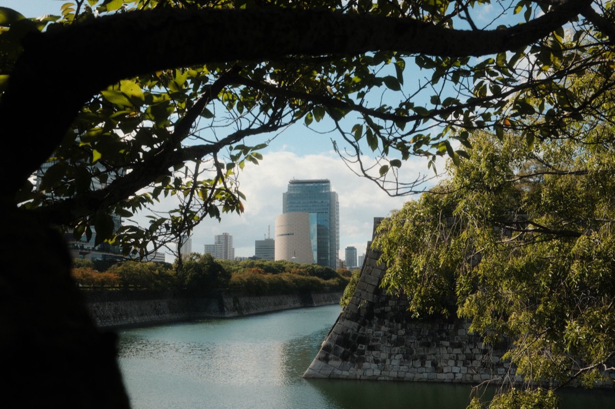 Modern Osaka Castle view with surrounding urban landscape