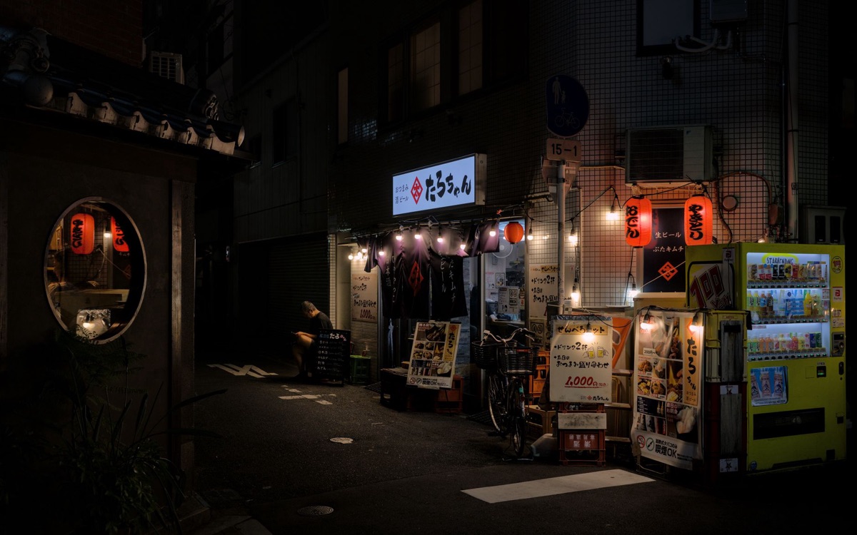 Osaka Street Vendors with Traditional Food Trucks