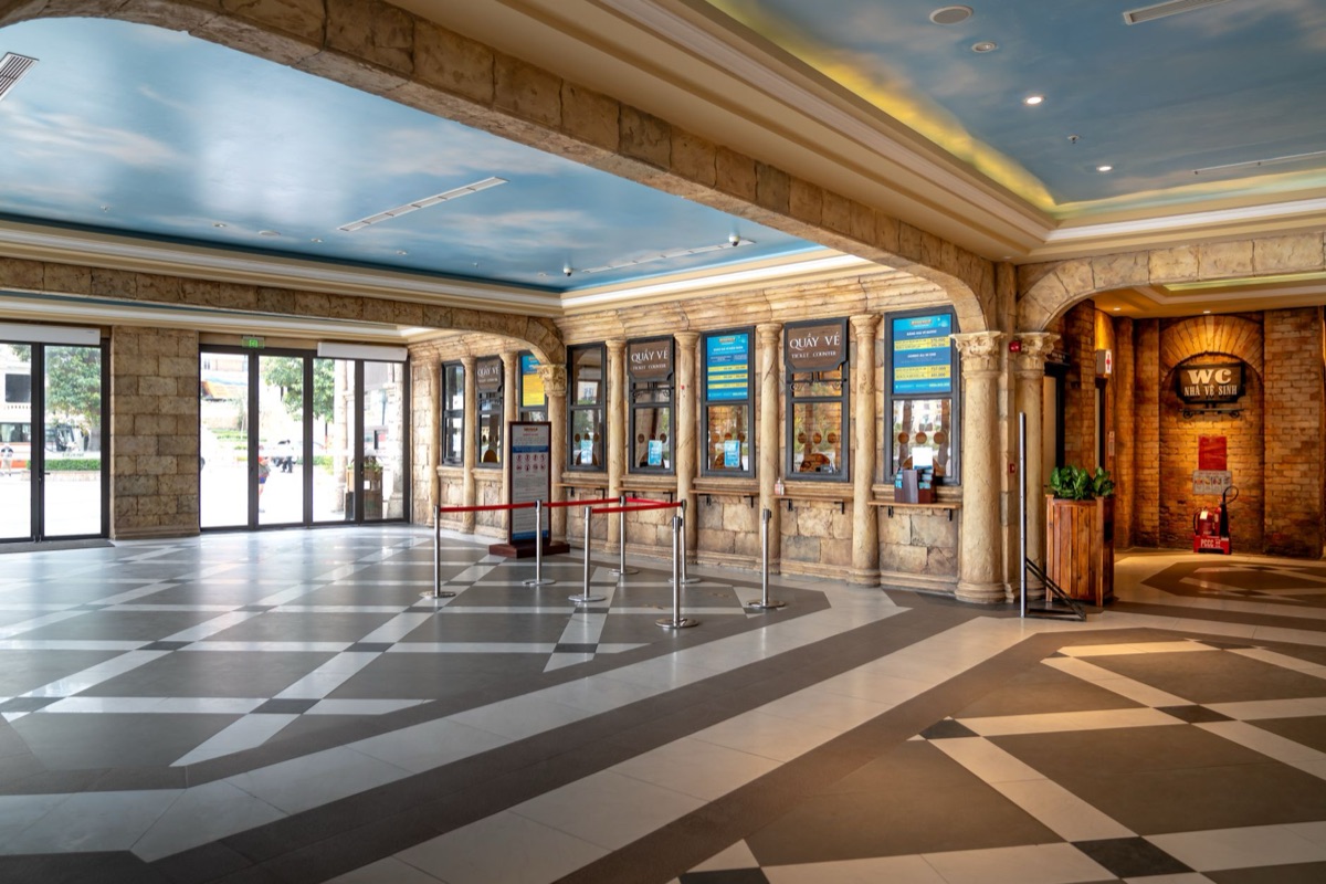 USJ ticket counter with brown paper ticket